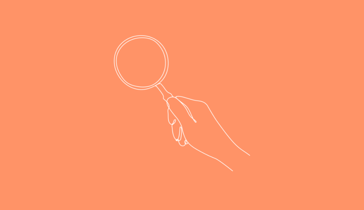 Magnifying glass on orange background